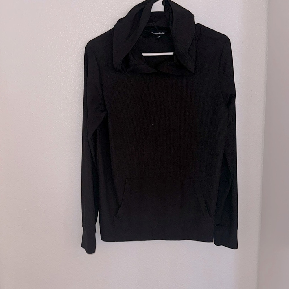Black ribbed light weight size medium long sleeve active wear shirt.